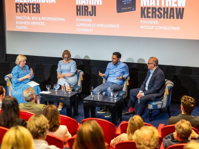 Rahim Hirji on a four-person panel at an Oystercatchers event in London, audience in the foreground